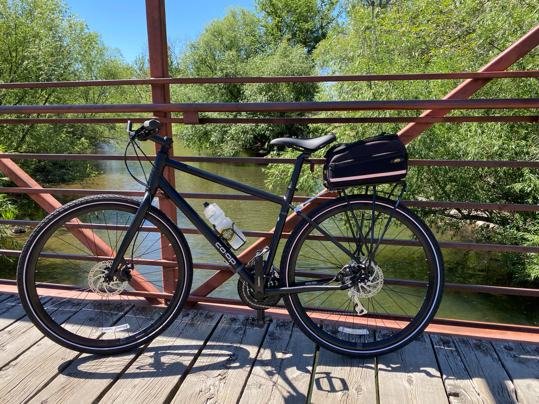 Bike on bridge overlooking the Boise Greenbelt